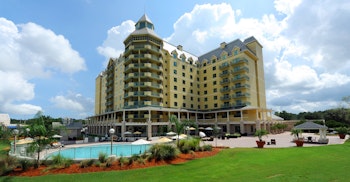 Renaissance Resort at World Golf Village with an outdoor pool and patio seating